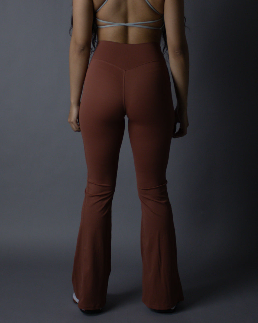 LE CHÉRIE "DÉESSE" V CROSS FLARE LEGGINGS IN SUNRISE ORANGE